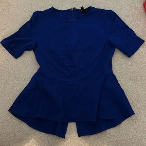 Cobalt blue bcbg maxazria peplum top with zipper detailing on back